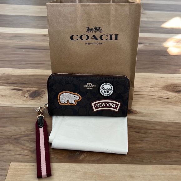 Coach Handbags - Brand new Long Zip Around Wallet In Signature Canvas With Patches